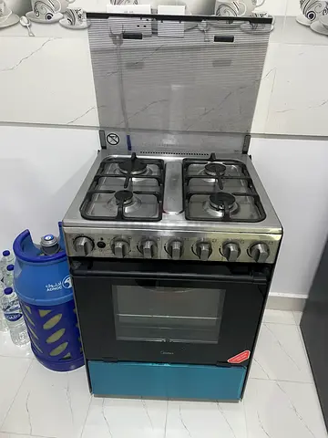 Used 4-Burner Gas Cooker with Oven - Good Working Condition