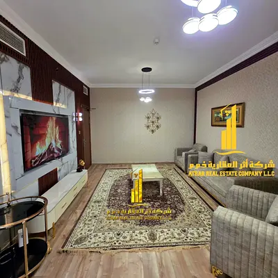 Luxury apartment for monthly rent, two bedrooms and a hall with a sea view, fully furnished with high-end hotel furniture and a fully equipped kitchen