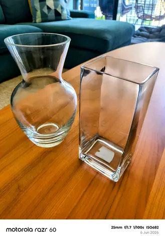 Two clear glass vases — round and rectangular