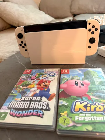 Nintendo Switch OLED Bundle + 2 Wireless Controllers + Games