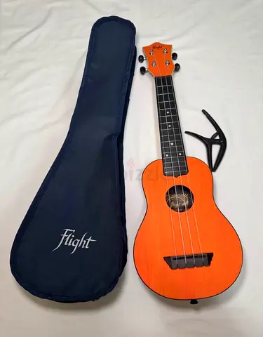 Flight Ukelele with Ernie Ball Capo