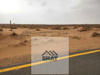 ارض سكني تجاري تصريح ارضي + 1 مواقف + 3 دور على شارع رئيسي  عرض 152 متر منطقة روضة القرط – الشارقة