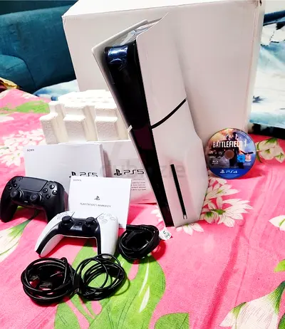 Playstation 5 Slim Disc 1 TB with 2 controllers and game.