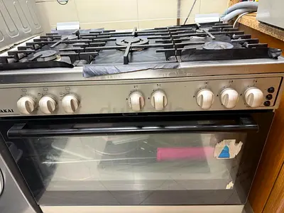 6-burner Stainless Steel Gas Cooker with Oven - Good Working Condition