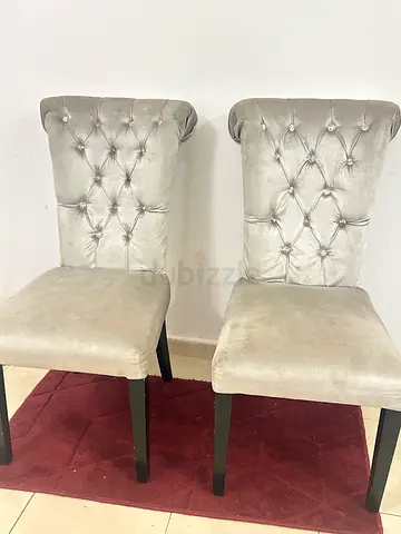 Pair of silver velvet tufted dining chairs