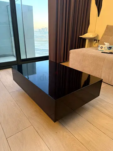 Low glossy black coffee table / TV stand - modern minimalist