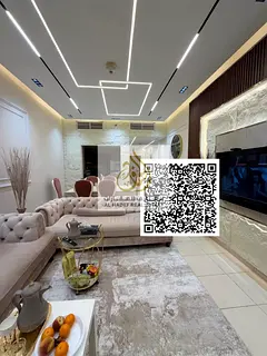 Two-bedroom apartment for sale in Ajman One Tower with city and garden views. Features include two m
