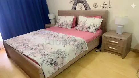 King size bed with mattress and 2 night stands