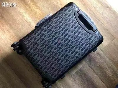 DIOR and RIMOWA cabin suitcase