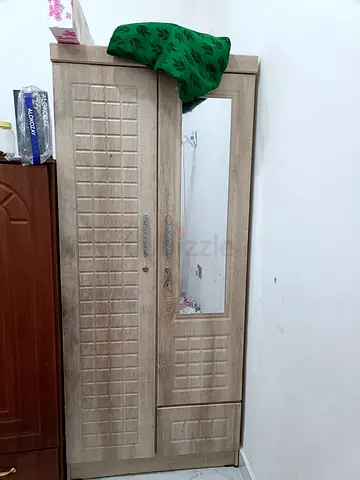 Two-door wooden wardrobe with mirror - good condition