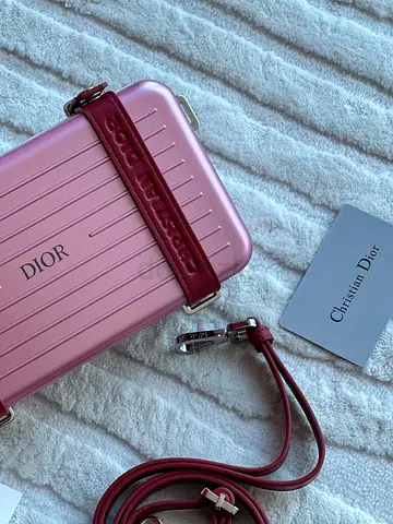 Dior and Rimowa personal clutch