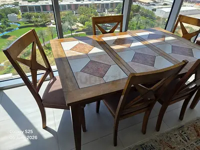 Solid Wood 6-Seater Dining Table with Cross-Back Chairs - Good Condition