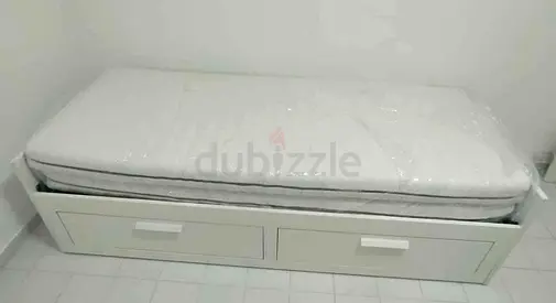 IKEA brimness daybed with 2 big storage drawers and 2 IKEA mattresses.
