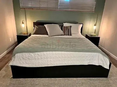 King size bed with mattress and 2 storage drawers
