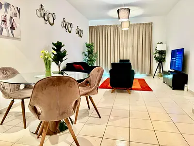 Dining table with 3 chairs . Marina home