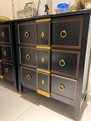 3 Black wooden dresser and gold handles