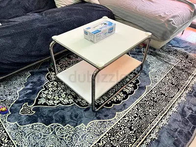 Ikea - Small white two-tier coffee table with chrome frame - good condition