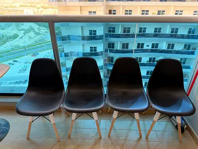 Set of 4 Modern Black Plastic Dining Chairs with Wooden Legs