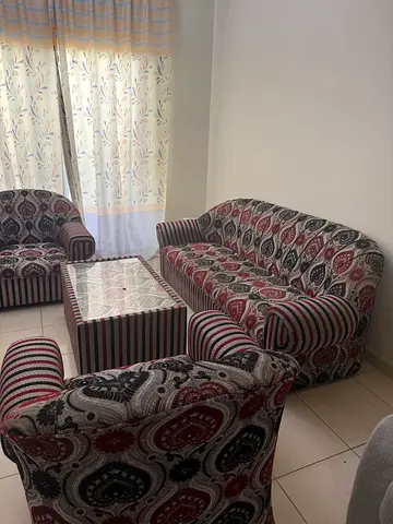 3-seater sofa set with matching armchairs and coffee table - good condition