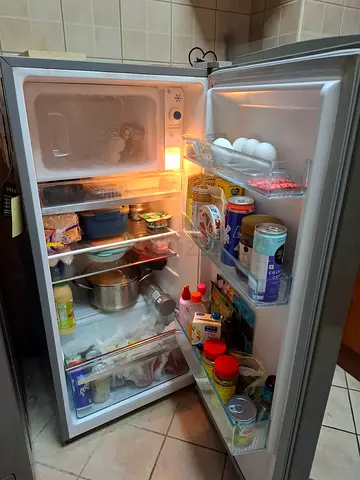Small single-door refrigerator with freezer compartment - used