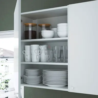 Ikea white storage cabinet with storage shelves, closing door only AED 99