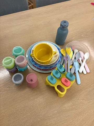Mixed baby feeding set — bowls, spoons, sippy cups and silicone molds