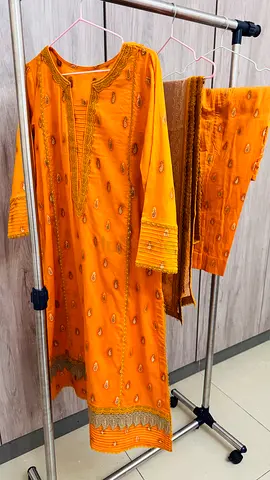 Mustard Yellow 3-Piece suit from Nishat .