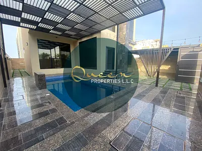 Fully furnished villa for annual rent in Al Alia Ajman featuring a covered swimming pool and separate annex 4 master bedrooms spacious living hall ful