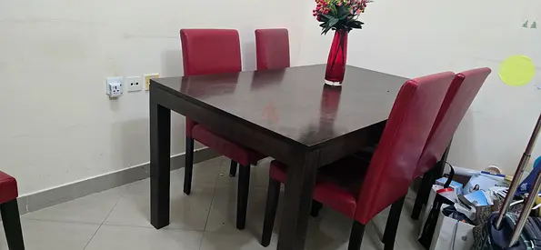Dark Wood Dining Table with 4 Red Upholstered Chairs - Good Condition