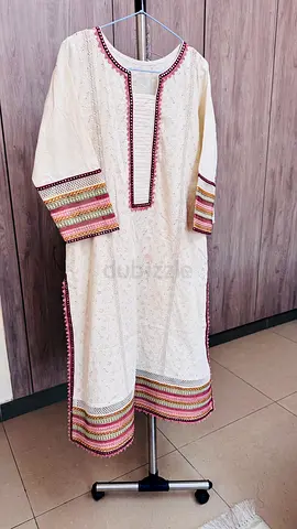 Cream Chikankari shirt and trouser from brand Kayseriya.