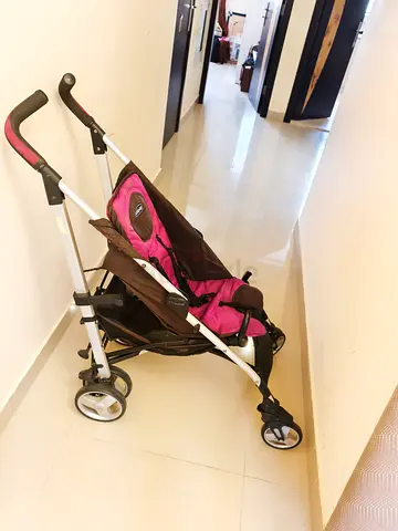 Stroller - Foldable, Lightweight pink  brown umbrella - good condition