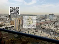 Studio apartment for sale, cash, freehold, in Al Nuaimiya Tower C, with balcony and private parking.
