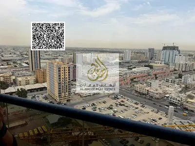 Studio apartment for sale, cash, freehold, in Al Nuaimiya Tower C, with balcony and private parking.