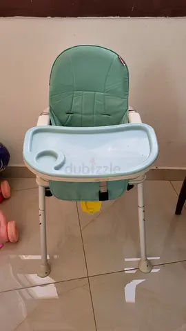 Light green baby high chair with removable tray - good condition