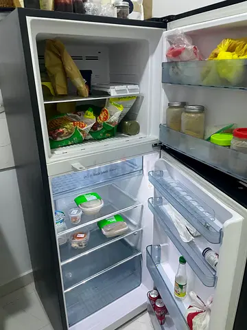 Used double-door refrigerator in good working condition
