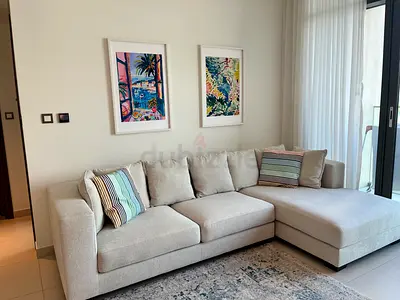 Light gray L-shaped 3-seater sofa with chaise