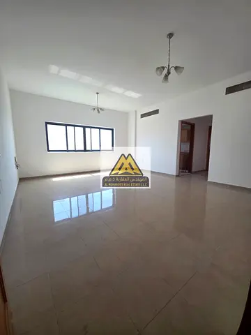 Bedroom Apartment for Annual Rent in Al Jurf 2 | Spacious Living Room | Prime Location