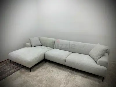 Like new condition the loom collection lshape sofa