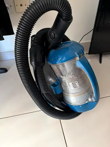 Used compact canister vacuum cleaner - working condition