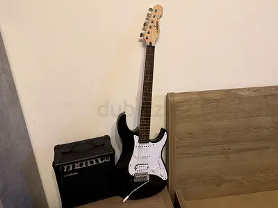 Black Squier-style Electric Guitar with Yamaha Practice Amp - Very Good Condition