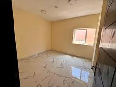 One bedroom apartment with living room for annual rent in Al Bu Tina Spacious layout modern finishin