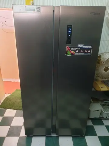 Stainless Steel Side-by-Side Refrigerator - Good Condition