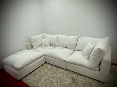 White color feather 🪶 filled sofa