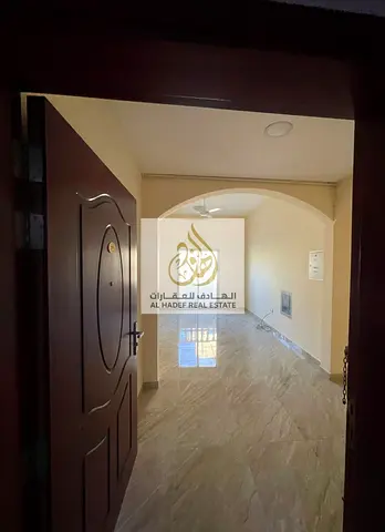 Annual rent in Ajman, Al Rawda 2 area, Sheikh Ammar Street, near Shurooq Mall. The building is for families. One bedroom, living room with balcony, ce