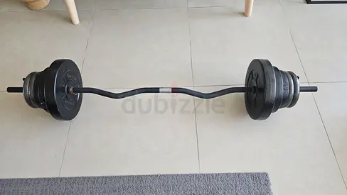 EZ curl bar with weight plates — used set