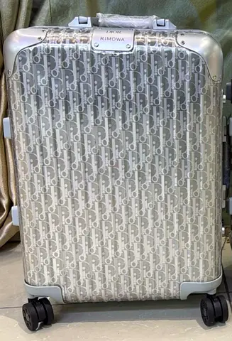 DIOR and RIMOWA carry on suitcase