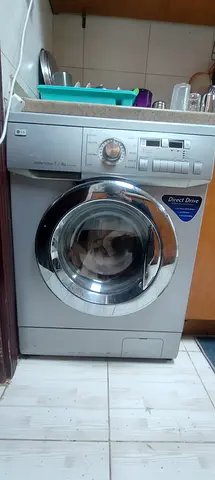 LG Front Load - Washer Dryer 7/4KG - Works well