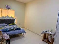 A furnished Bed room with separate bathroom