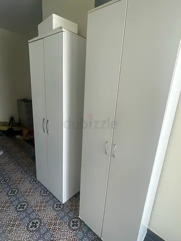 White 1/2-Piece Wardrobe/Armoire Set — Good Condition. 250 for both 150 for one