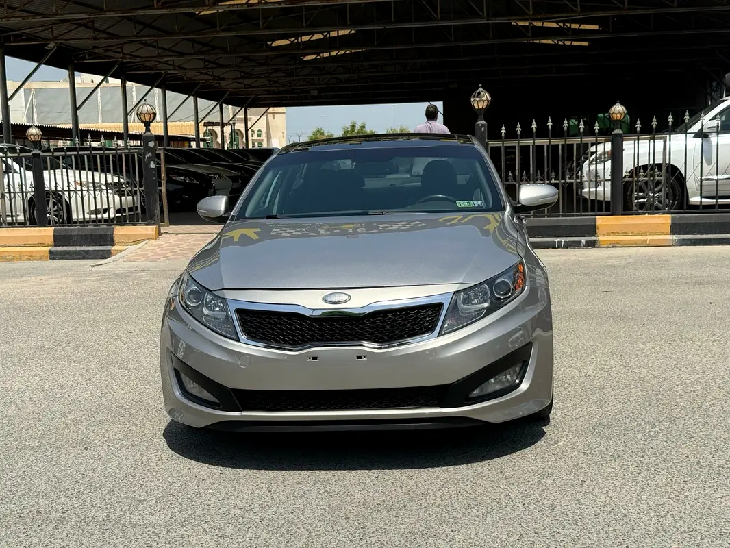 Kia Optima 2013 — photo 1 of 18